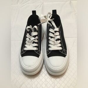 TAXI Classic Black Canvas Low-Top Sneakers with White Trim - Men's